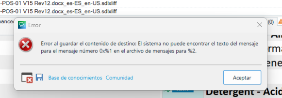 Trados Studio error message dialog box stating 'Error al guardar el contenido de destino: El sistema no puede encontrar el texto del mensaje para el mensaje n mero 0x%1 en el archivo de mensajes para %2.' with an accept button.