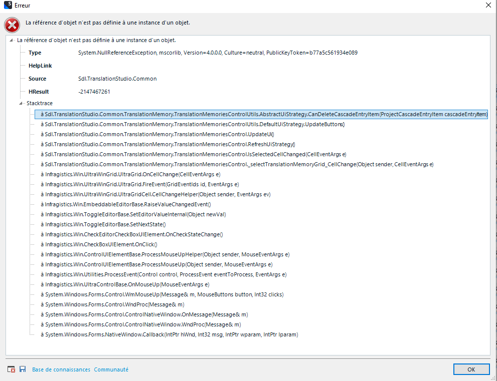 Error message in Trados Studio showing 'La reference d'objet n'est pas definie a une instance d'un objet' with a System.NullReferenceException and stack trace details.