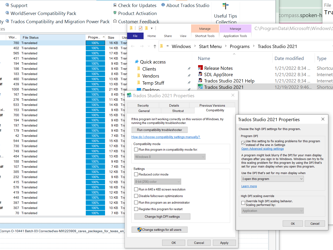 Screenshot showing Trados Studio 2021 with tiny UI font size compared to larger system font size on Windows 10 settings.