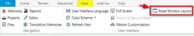 Screenshot of Trados Studio interface highlighting the 'Reset Window Layout' option in the 'View' tab, indicated by a red arrow and box in the top right corner.
