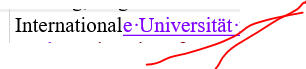 Screenshot of Trados Studio editor showing text 'Internationale Universit t' with unexpected underline formatting.