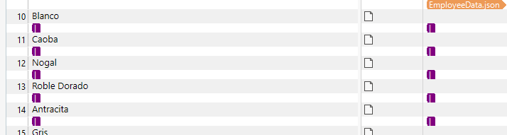 Screenshot of Trados Studio showing a list of segment names such as Blanco, Caoba, Nogal, Roble Dorado, Antracita, Gris with checkboxes next to each and a file named EmployeeData.json.