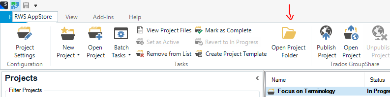 Trados Studio interface showing the 'Projects' tab with an active project named 'Focus on Terminology' and an arrow pointing to 'Open Project Folder' option.