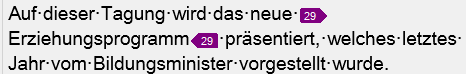 Screenshot of Trados Studio with the pilcrow button ( ) activated, showing non-printing characters like spaces and paragraph marks in the text segment.