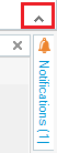 Trados Studio interface showing the little arrow button to expand the ribbon, next to the Notifications tab.