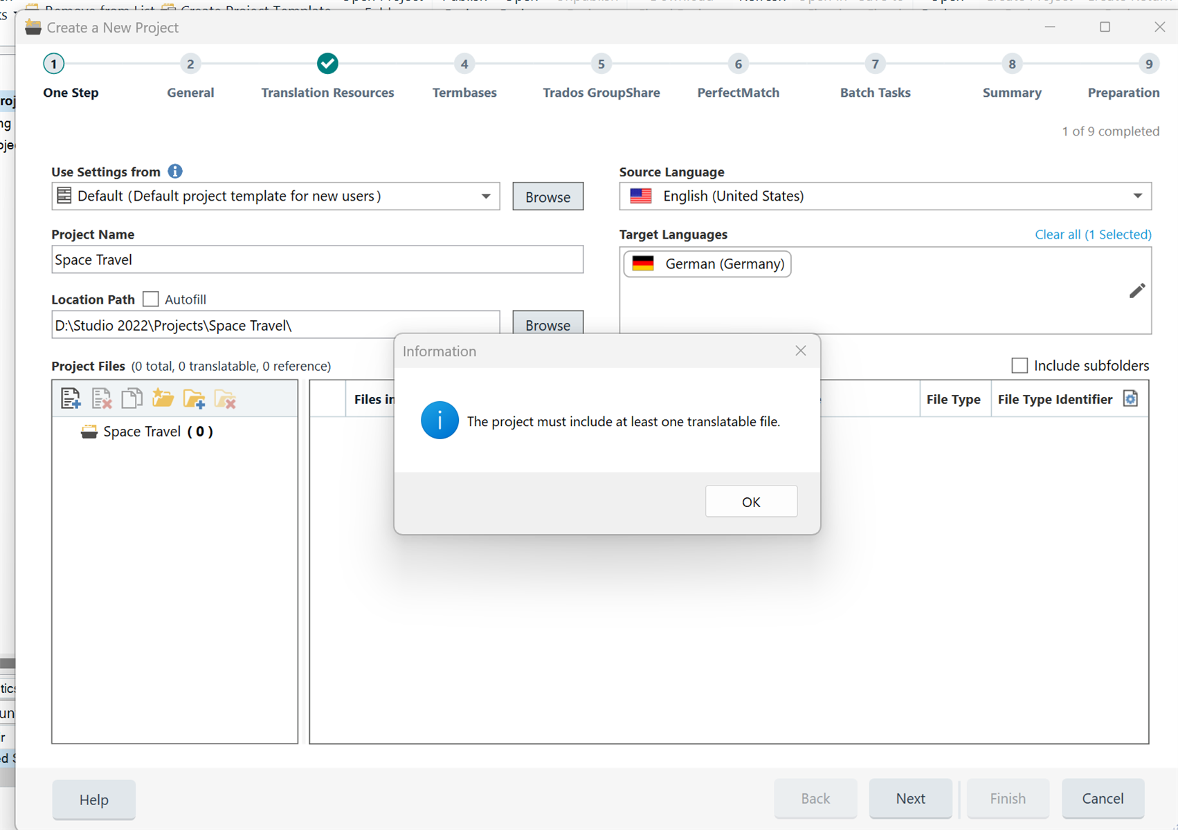 Trados Studio 2022 SR 1 error message stating 'The project must include at least one translatable file' during new project creation with 'Space Travel' as the project name and file path set to D drive.