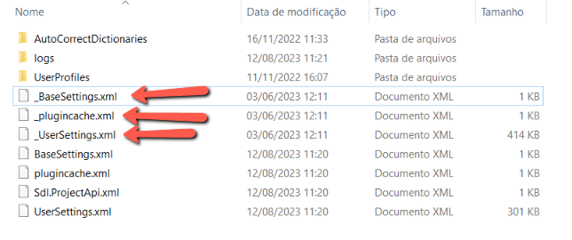 File explorer window showing duplicated folders in Trados Studio with highlighted -BaseSettings.xml, -plugincache.xml, and -UserSettings.xml alongside their non-dashed counterparts.