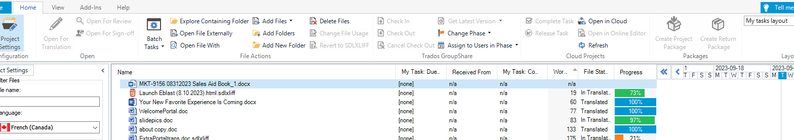 Trados Studio interface showing a list of files with their progress. The file 'MKT-9156 08312023 Sales Aid Book_1.docx' has a different Word icon and is not translated.
