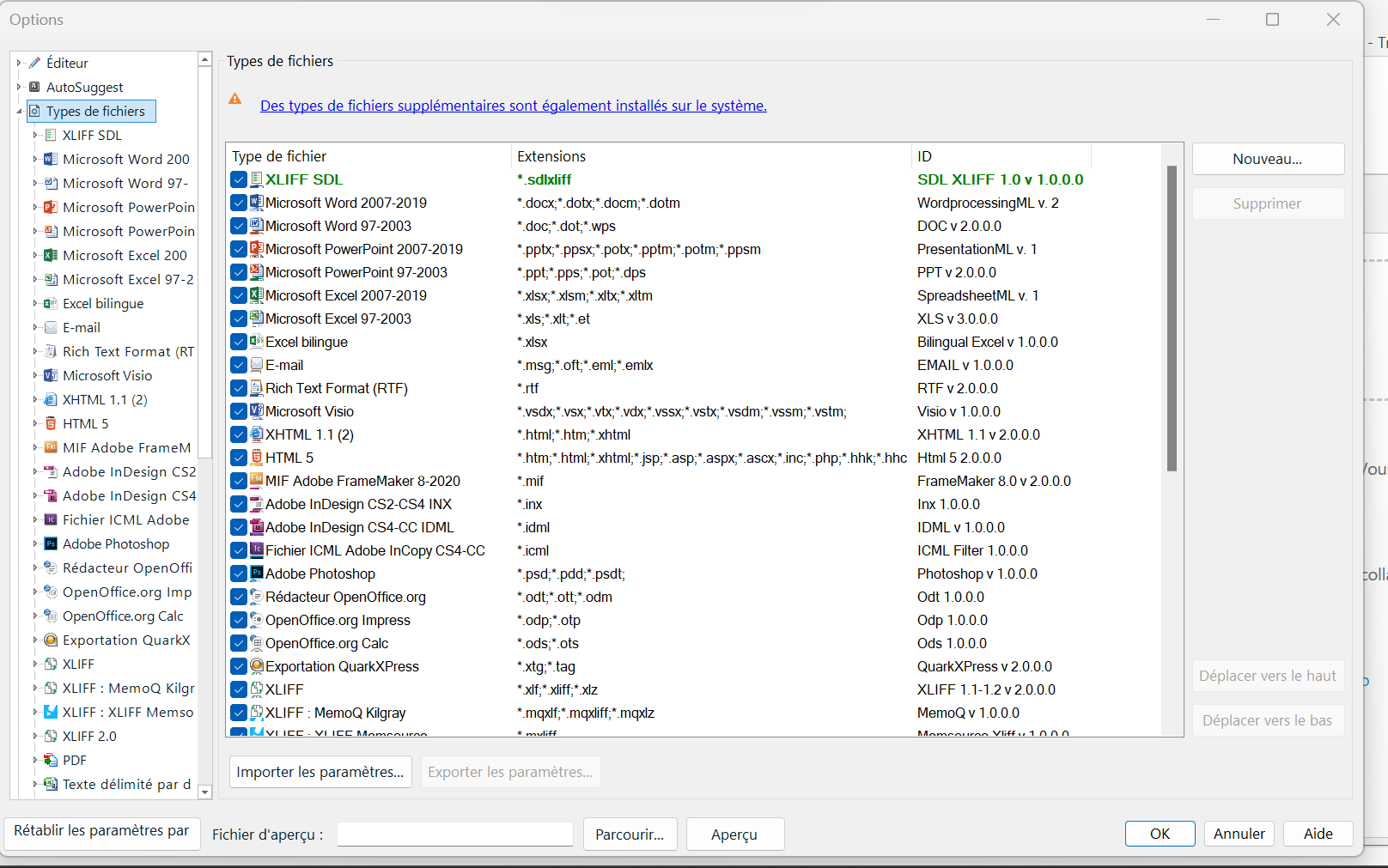 Trados Studio Options window showing file types with a warning message 'Des types de fichiers supplementaires sont egalement installes sur le systeme.'