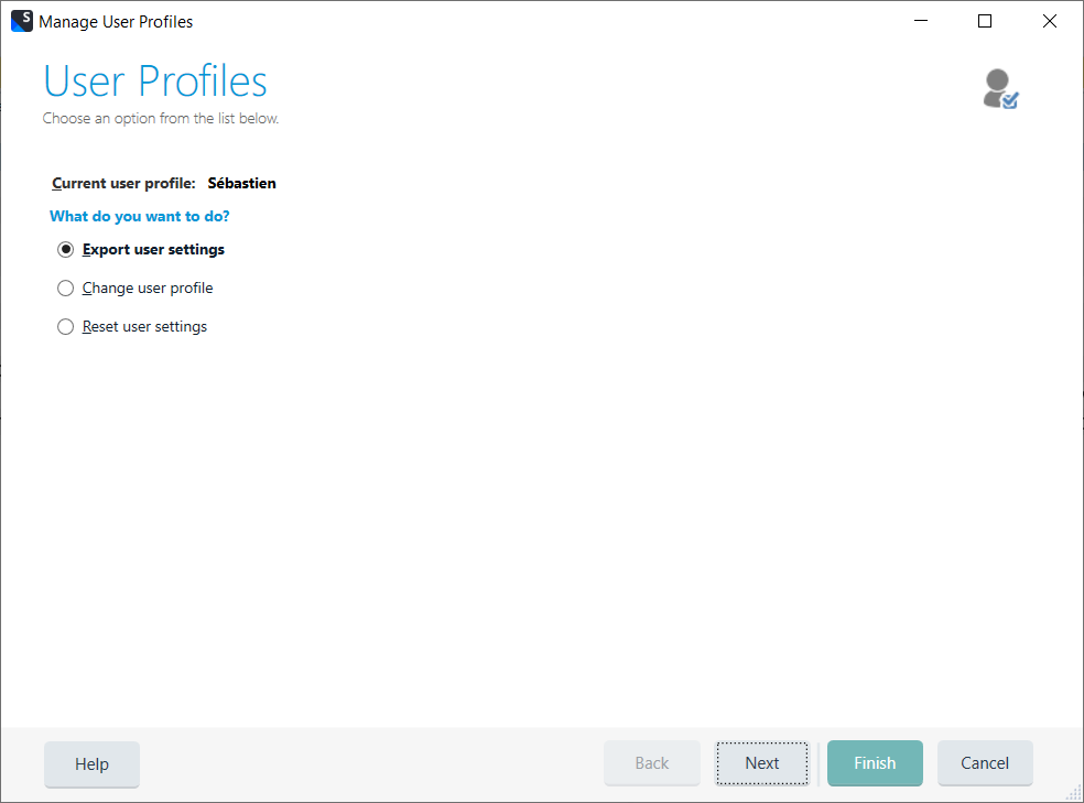 Trados Studio Manage User Profiles window with options to Export user settings, Change user profile, and Reset user settings. 'Export user settings' is selected. Current user profile is Sebastien.