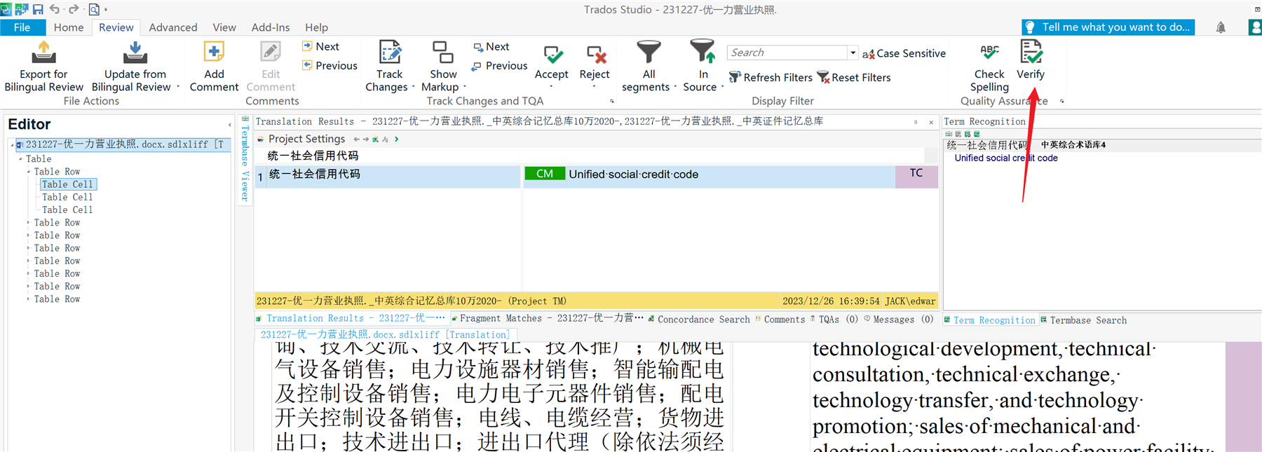 Screenshot of Trados Studio Editor with a document open, showing the 'Term Recognition' pane with a highlighted term and its translation. A red arrow points to the 'Verify' button in the toolbar.