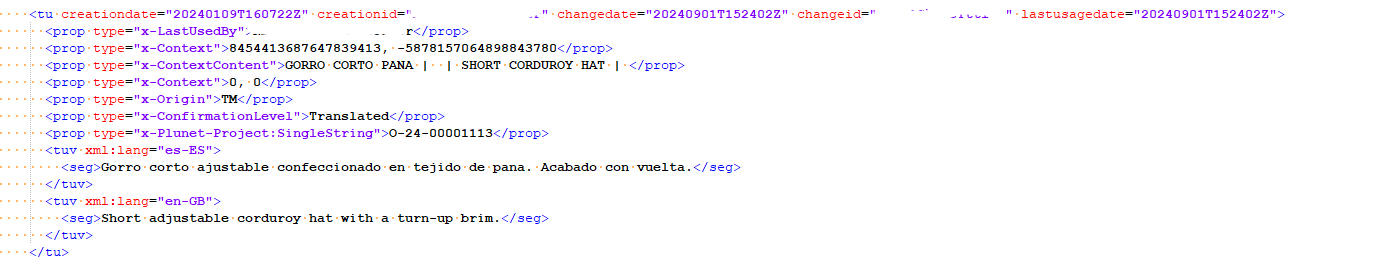 Screenshot of a TMX file code snippet in Trados Studio showing a translation unit with a creation date and changed date where the day and month appear to be reversed.