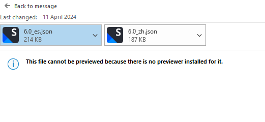 Trados Studio message stating 'This file cannot be previewed because there is no previewer installed for it.' with two JSON files listed: 6.0_es.json and 6.0_zh.json.