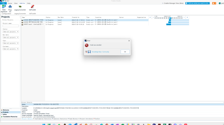 Screenshot of Trados Studio with an error dialog box stating 'A task was canceled.'