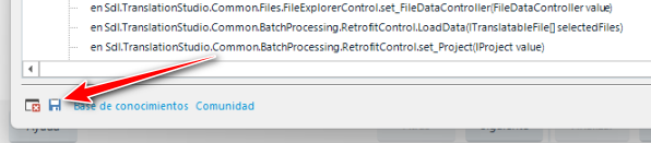Screenshot of Trados Studio error message with a red arrow pointing to a disk symbol in the error stack window.