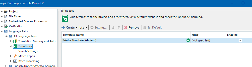 Screenshot of Trados Studio Project Settings showing the Termbases section. A 'Printer Termbase (default)' is listed with 'Enabled' checked, but the 'Filter' column says '(Not specified)'.