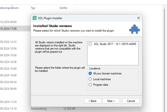 SDL Plugin Installer window with 'Installed Studio versions' section. A checkbox labeled 'SDL Studio 2017 - 14.1.10015.44945' is ticked. Text on the left indicates incompatible versions will be grayed out.