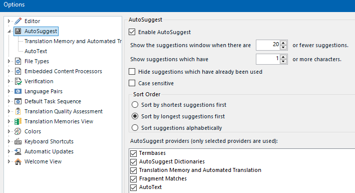 Screenshot of Trados Studio 2024 AutoSuggest settings. 'Enable AutoSuggest' is checked. Options for 'Show suggestions window when there are 20 or fewer suggestions' and 'Show suggestions which have 1 or more characters' are visible. 'Term bases', 'AutoSuggest Dictionaries', 'Translation Memory and Automated Translation', 'Fragment Matches', and 'AutoText' are selected.