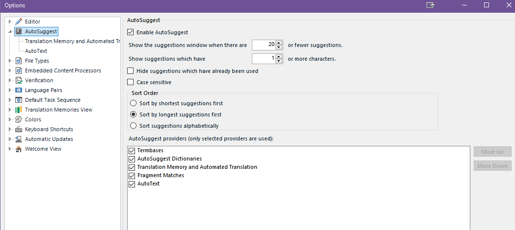 Trados Studio AutoSuggest options window showing 'Enable AutoSuggest' checked with various settings for suggestions display and providers like TermBases and AutoText.