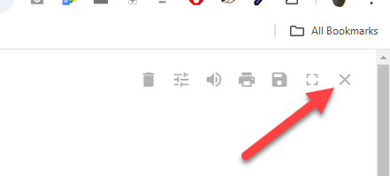 Close-up of a browser's top right corner showing an 'X' button to exit Reader Mode, indicated by a red arrow.