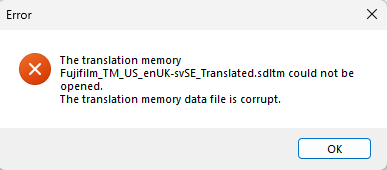 Error dialog box in Trados Studio showing 'The translation memory Fujifilm_TM_US_enUK-svSE_Translated.sdltm could not be opened. The translation memory data file is corrupt.'