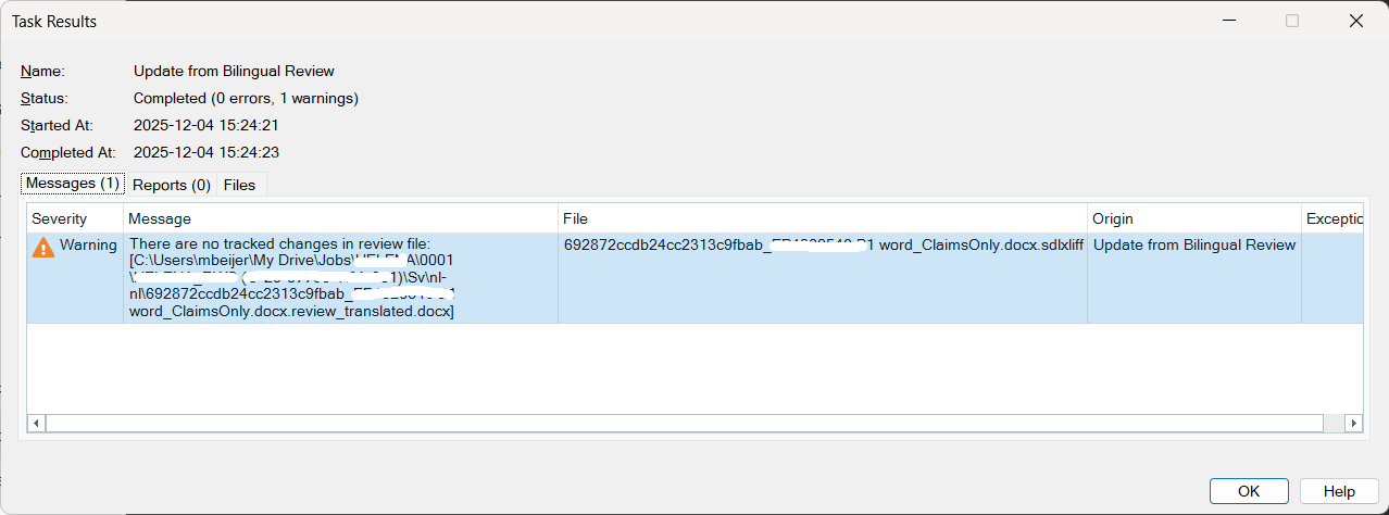 A task results window showing a warning message: 'There are no tracked changes in review file' followed by a file path. The status indicates 'Completed (0 errors, 1 warnings)'.