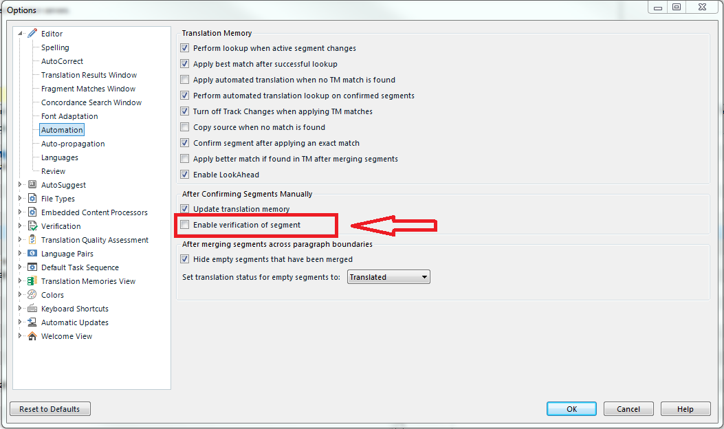 Trados Studio options window with 'Verification' section highlighted, showing 'Enable verification of segment' option unchecked as indicated by a red arrow.