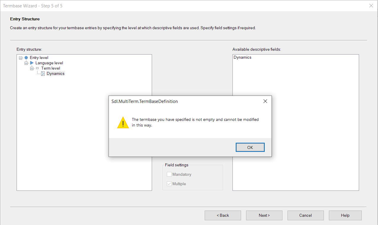 Error message in Trados Studio's Termbase Wizard stating 'The termbase you have specified is not empty and cannot be modified in this way.' with an OK button.