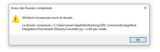 Error message window in French stating 'Compressed Folders Error' with a warning icon. Text reads 'Windows cannot open the folder. The compressed folder C:UserssevenAppDataRoamingSDL CommunityAppStoreIntegrationDownloadsGlossaryConverter.zip is not valid.'