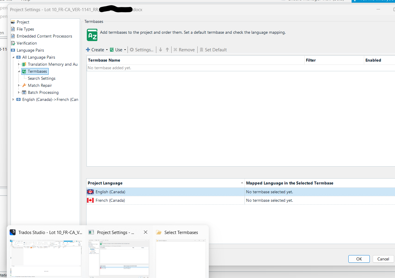 Screenshot of Trados Studio showing the 'Project Settings - Termbases' tab with no termbase added. A 'Select Termbases' window appears in the background, indicating an issue with window accessibility.