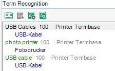 Term Recognition window showing 'USB Cables' and 'photo printer' with their German translations 'USB-Kabel' and 'Fotodrucker' respectively, each with a score of 100 from 'Printer Termbase'.