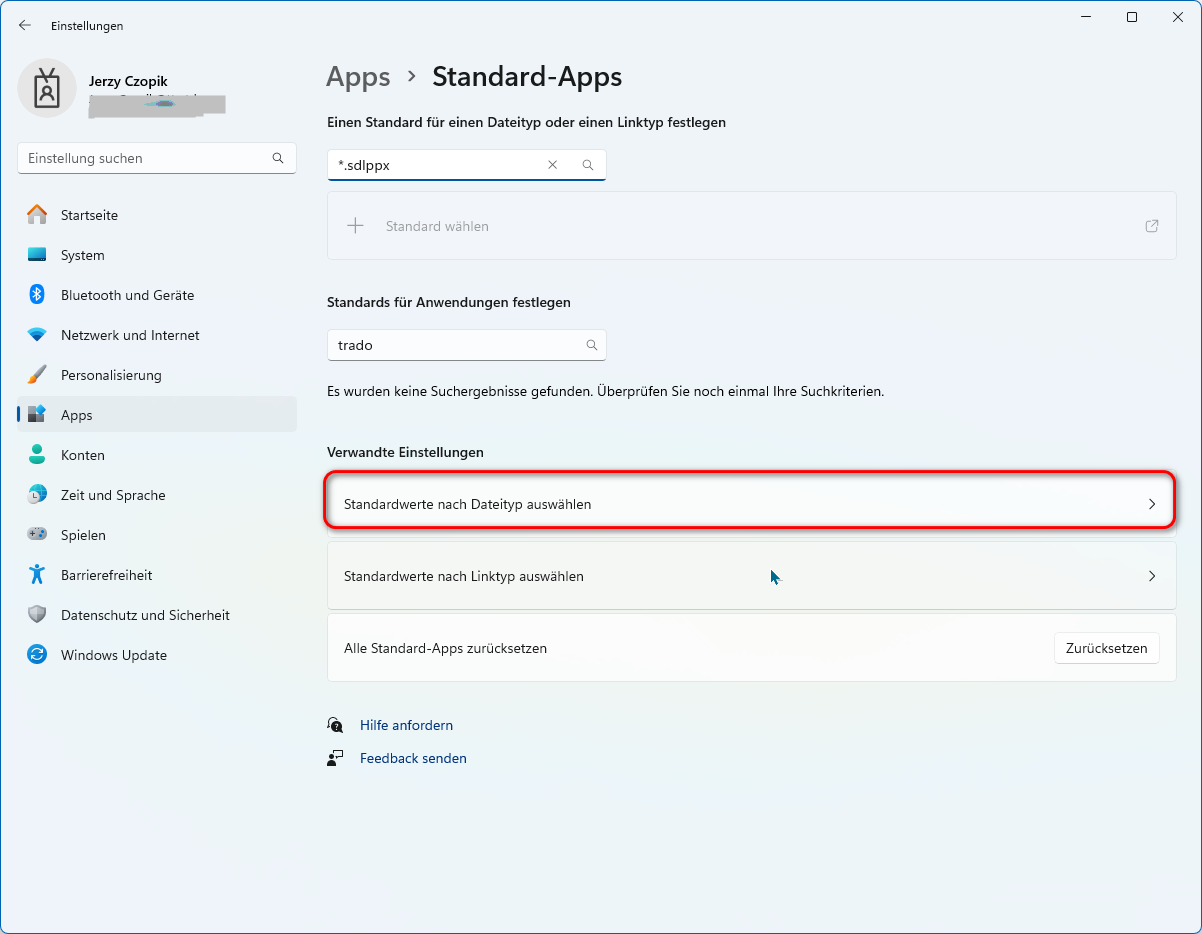 Settings window showing 'Standard-Apps' with a search box containing the text 'trado'. A message indicates no search results found. An option 'Standardwerte nach Dateityp auswahlen' is highlighted.