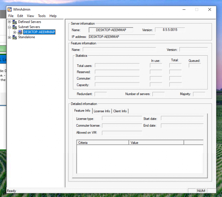 WlmAdmin utility showing server information with name DESKTOP-AEEMMAP and IP address field empty. Feature information and detailed information sections are blank.