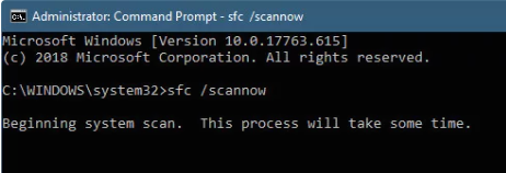 Command Prompt window showing the initiation of a System File Check with the command 'sfc scannow' and a message stating 'Beginning system scan. This process will take some time.'
