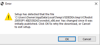 Error message during Trados Studio 15 installation on Windows 10, stating 'Setup has detected that the file vcredist_x86.exe has changed since it was initially published.' with options to retry download or cancel.