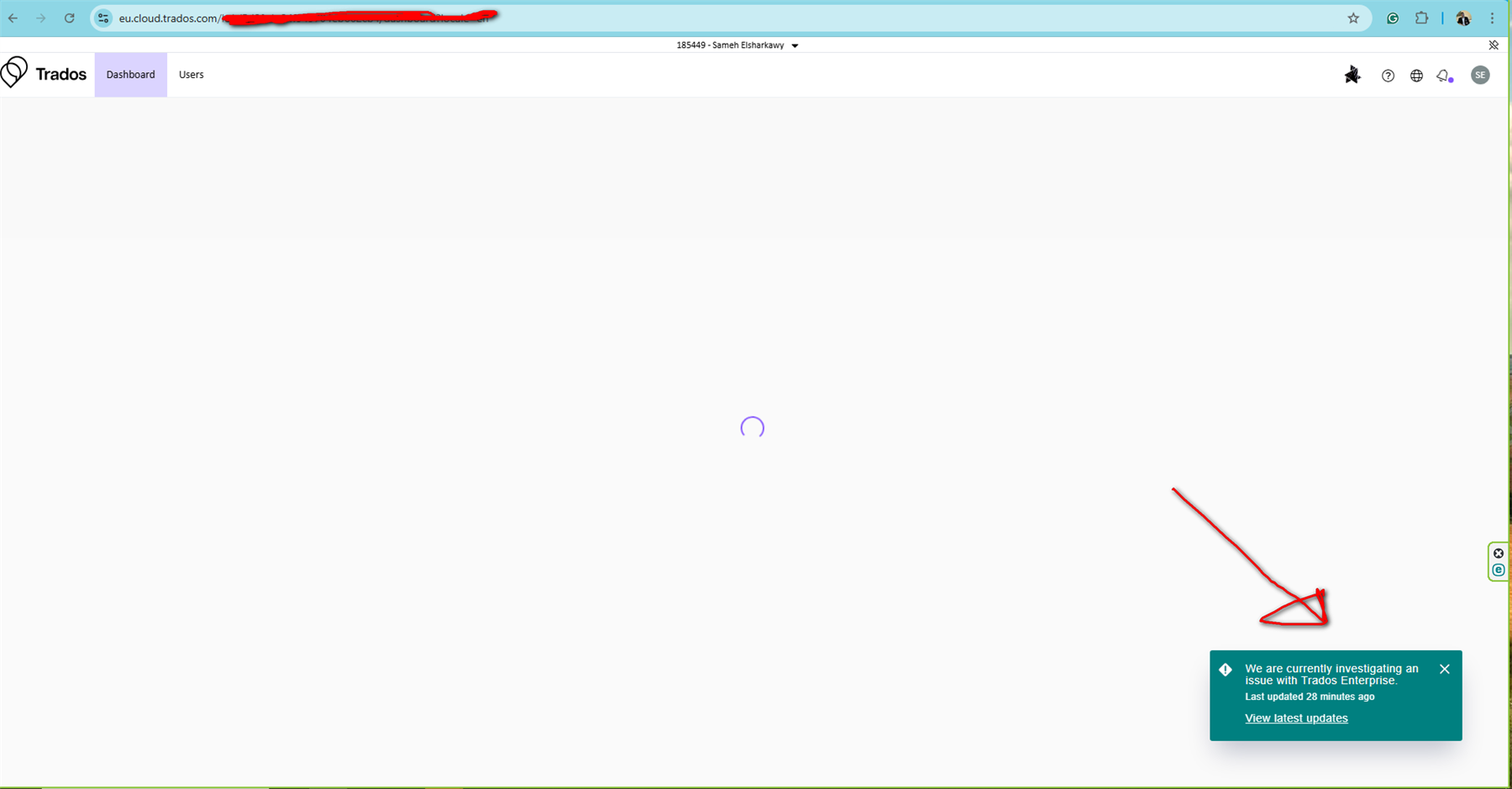 Screenshot of the Trados dashboard with a loading spinner in the center and a notification at the bottom right stating 'We are currently investigating an issue with Trados Enterprise. Last updated 28 minutes ago.'