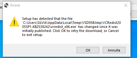Error message during Trados Studio 2015 installation stating 'Setup has detected that the file vcredist_x86.exe has changed since it was initially published.' with options to retry or cancel.
