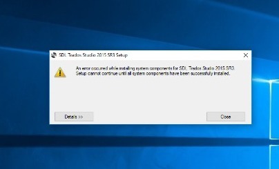 Error message stating an error occurred while installing system components for SDL Trados Studio 2015 SR2 and setup cannot continue until all components have been successfully installed.