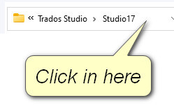 Screenshot showing a highlighted link labeled 'Click in here' within the Trados Studio breadcrumb navigation path.