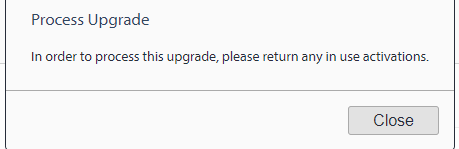 Error message in Trados Studio upgrade process stating 'In order to process this upgrade, please return any in use activations.' with a Close button.