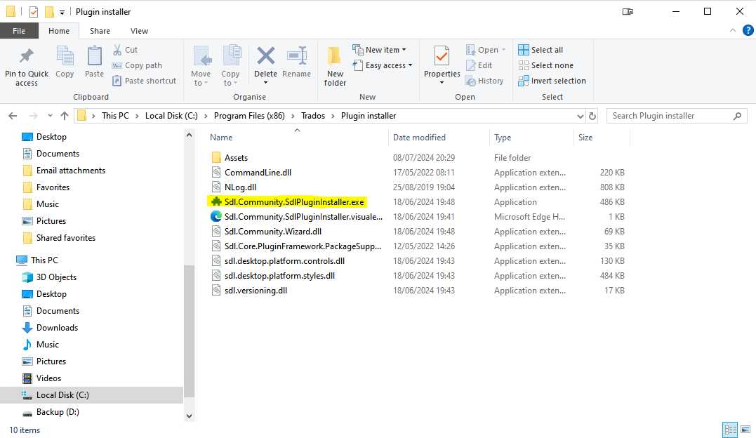 File Explorer window open to the Plugin installer directory with Sdl.Community.SdlPluginInstaller.exe highlighted.