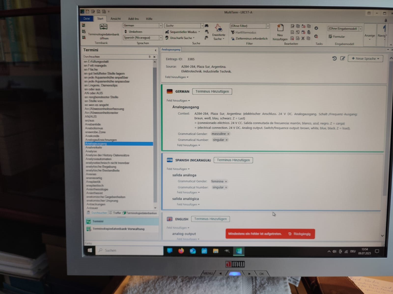 Computer screen displaying MultiTerm software with terminology database open. Error message in red at the bottom reads 'Mindestens ein Fehler ist aufgetreten.'