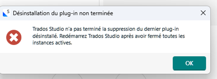 Error message in French stating 'Uninstallation of the plug-in not completed' with instructions to restart Trados Studio after closing all active instances.
