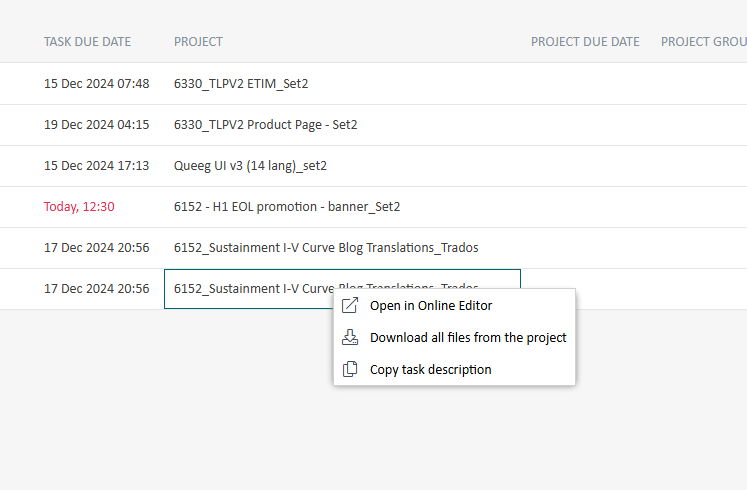 Screenshot of Trados Enterprise Inbox showing a list of projects with tasks due dates, project names, and a context menu open for one project with options: Open in Online Editor, Download all files from the project, Copy task description.