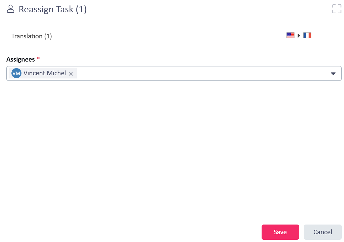 Reassign Task screen showing a dropdown to select assignees, with Vincent Michel selected, and Save and Cancel buttons at the bottom.
