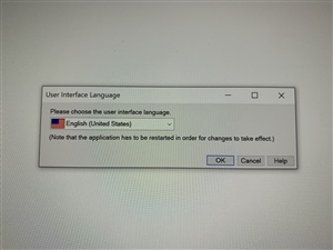 Dialog box prompting to choose the user interface language for SDL Trados Studio with English (United States) selected.