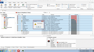 Screenshot of Trados Studio with an 'Out of memory' error dialog box in the center, over a blurred background of the Passolo 2016 interface.
