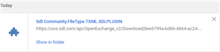 Download notification for SDL Community FileTypeSupport TXML plugin with a link and 'Show in folder' option.