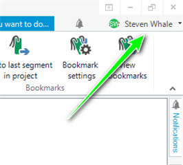 Trados Studio interface showing the 'Bookmark settings' option highlighted with a green arrow.