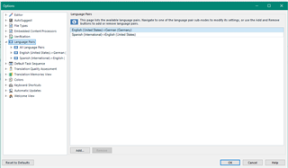 Trados Studio Options window showing Language Pairs tab with a list including English (United States) - German (Germany) and Spanish (International) - English (United States).